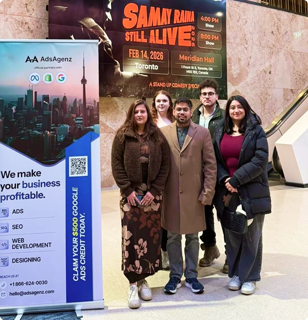 five people standing against a standee, AdsAgenz, february 14 2026, live comedy show, law firm digital marketing agency