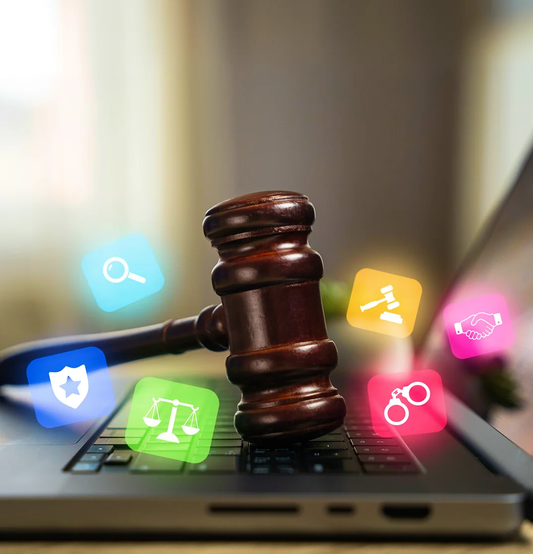 gavel on keyboard, magnifying glass, handcuffs, shield, laptop, law firm digital marketing agency
